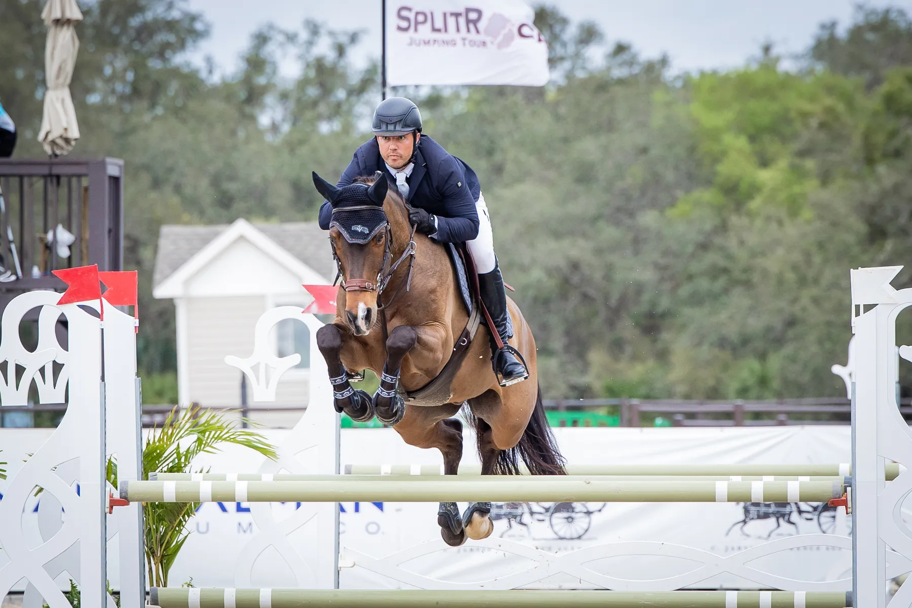 Alex Granato riding Indio to second in the $100,000 Dutta Corporation 1.25m Championship at the Split Rock Jumping Tour