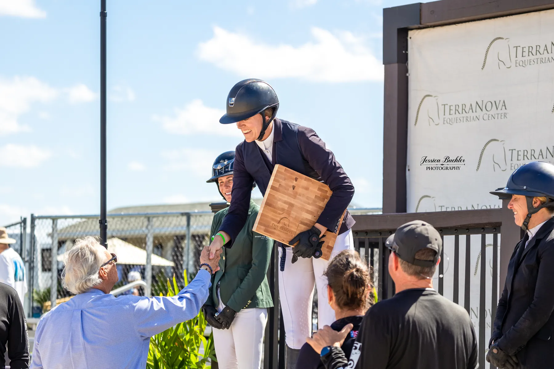 Alexandra Worthington accepts the Owner's Award at the Equestrian Services International FEI Grand Prix