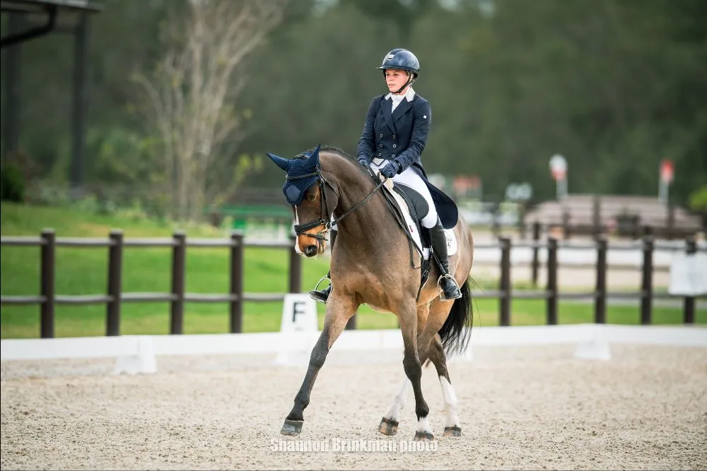 Alyssa Phillips riding Cornelius Bo in dressage at The Estates at TerraNova CCI3*-L