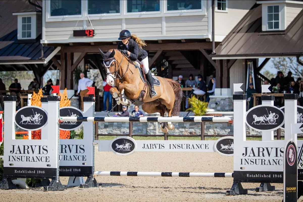 Caroline Mawhinney riding Dance du Buisson Z in the $100,000 Lugano Diamonds Grand Prix at Split Rock Sarasota