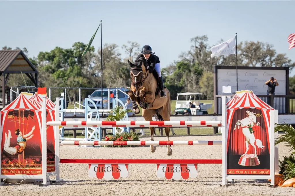 Catherine Kubiak riding Huntington to win the $7,000 1.40m Junior/Amateur Jumper Classic at TerraNova