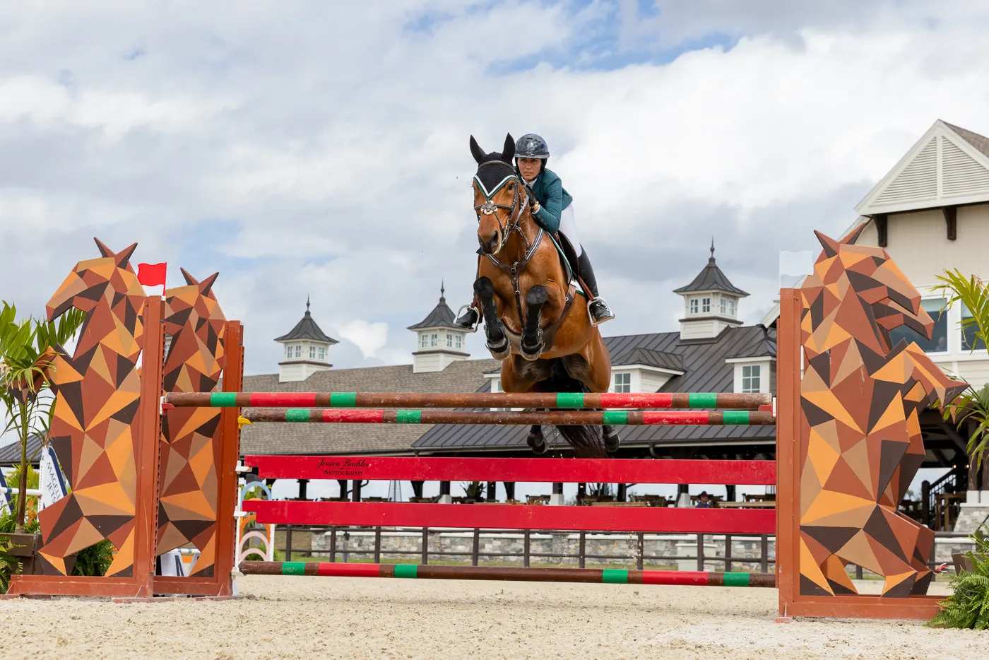 Christina Kelly riding Qatar over a jump to win the $20,000 Marsh McLennan Agency 1.35m TerraNova Prix
