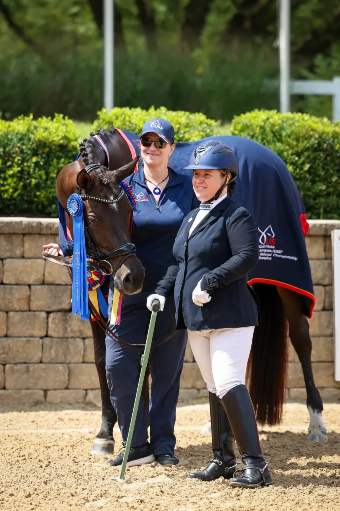 Ellie Brimmer riding My Moment in para dressage competition