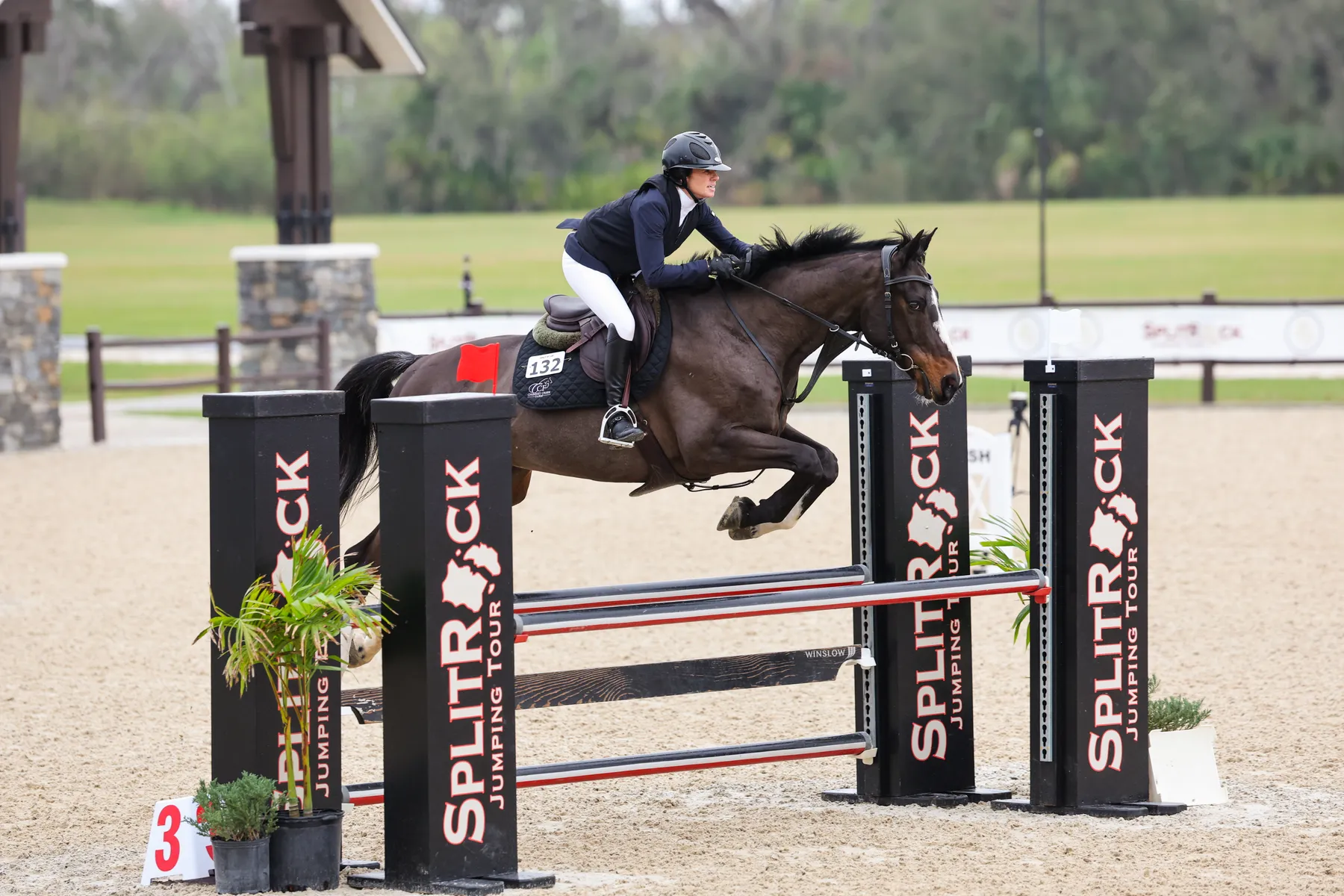 Erin Bownds riding Irish to win the $25,000 Dutta Corporation 1.0m Championship at the Split Rock Jumping Tour