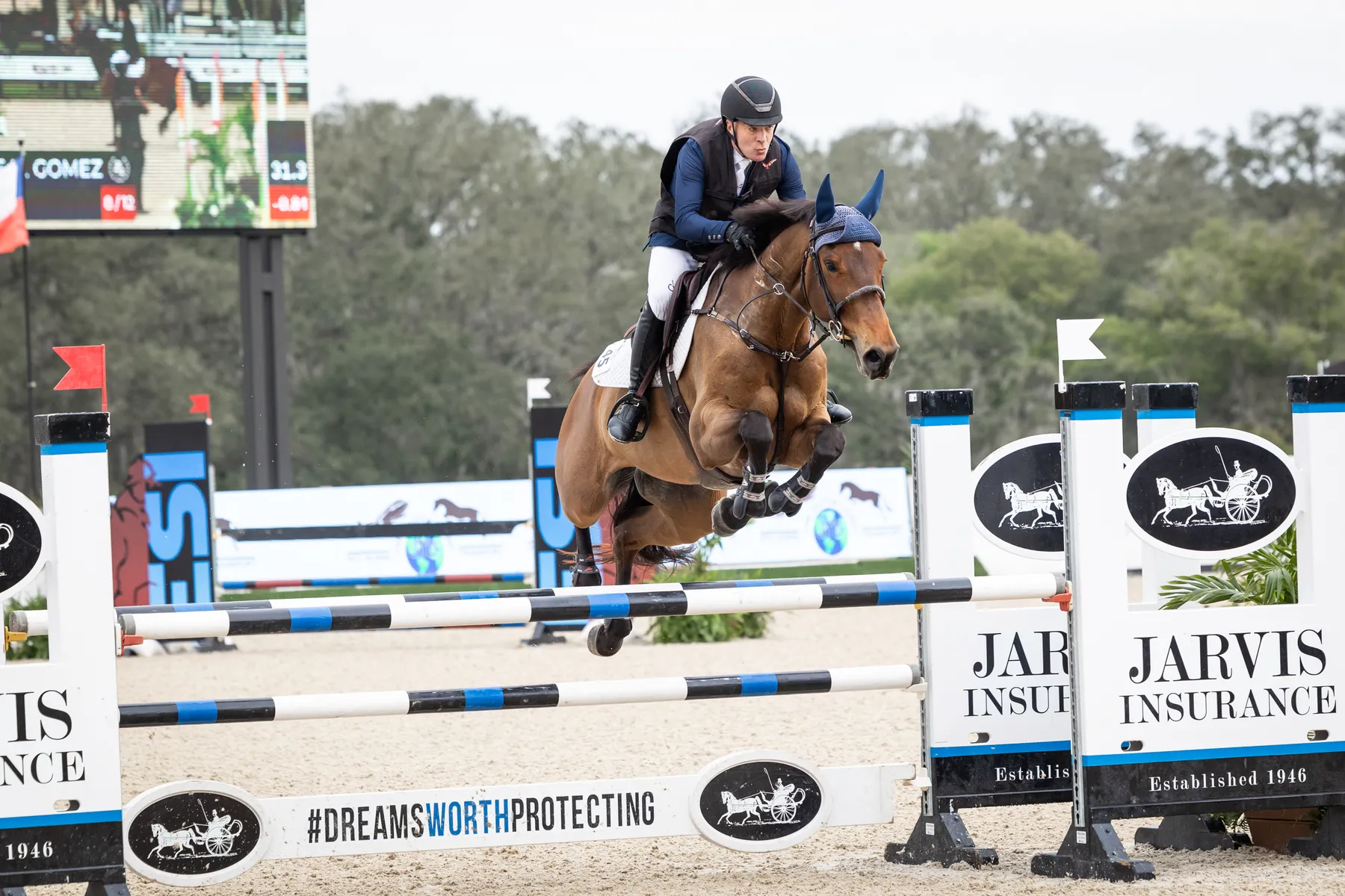 Jorge H. Gomez riding Kyrol to third in the $75,000 Dutta Corporation 1.15m Championship at the Split Rock Jumping Tour