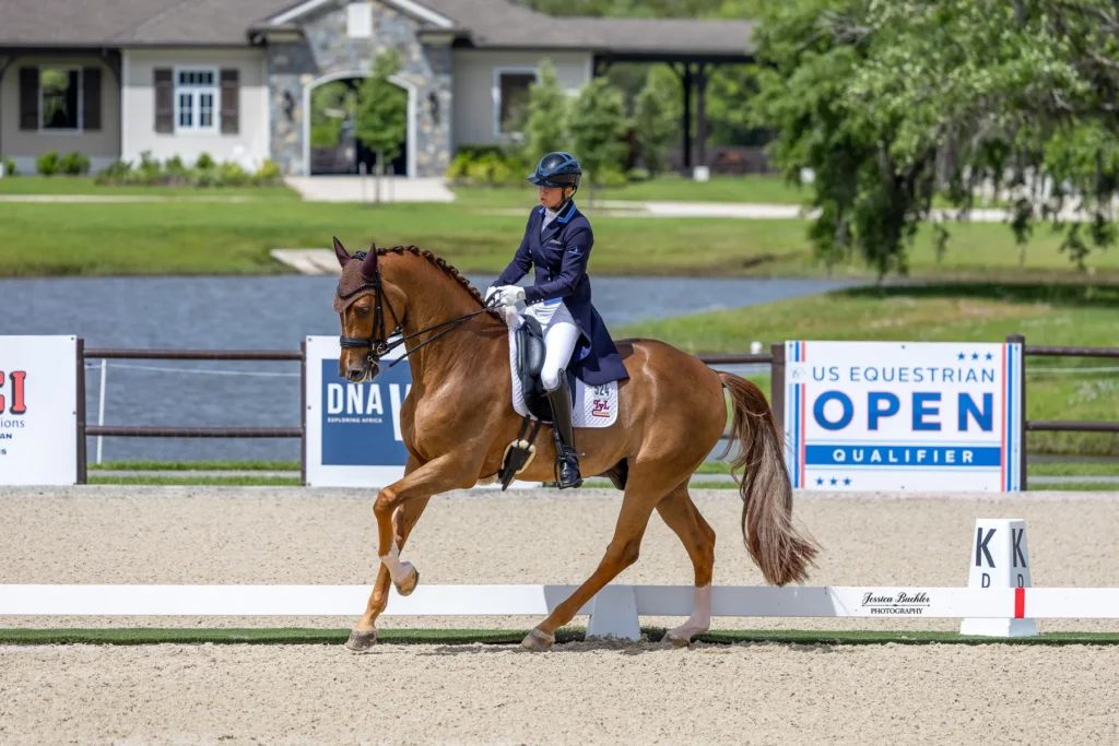 Katie Duerrhammer riding Vividus QRE to victory in the CDI3 Grand Prix at TerraNova