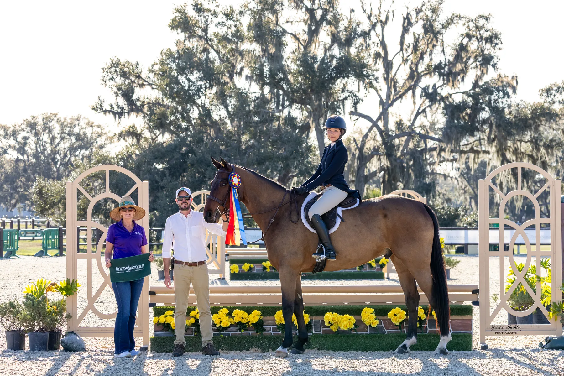 Khloe Pyle riding Genesis Z over a hunter fence in the $500 Rood and Riddle 2 foot 6 inch Hunter Derby at TerraNova
