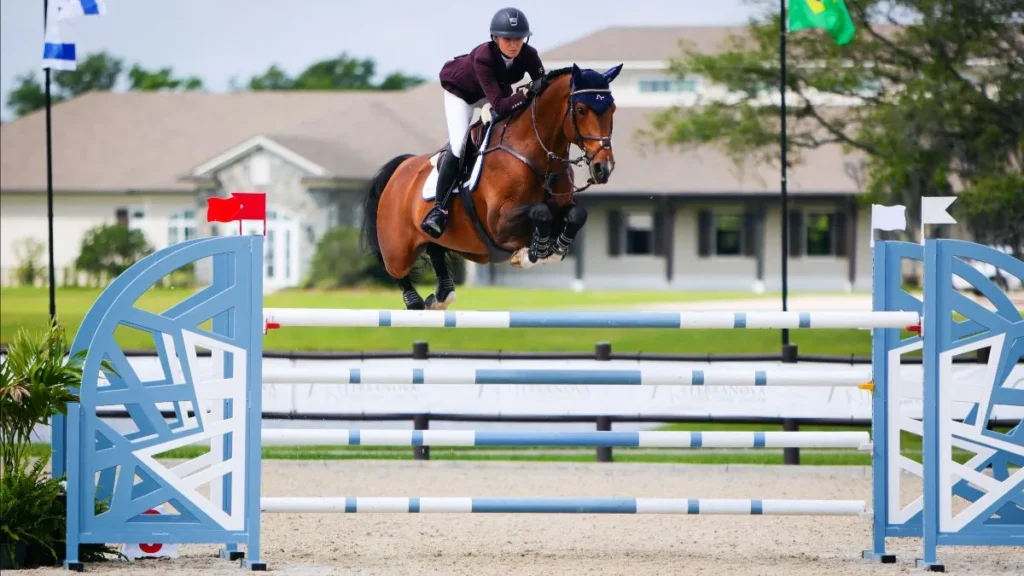 Lillie Keenan riding Kick On to win the $65,000 The Estates at TerraNova FEI 1.45m Grand Prix