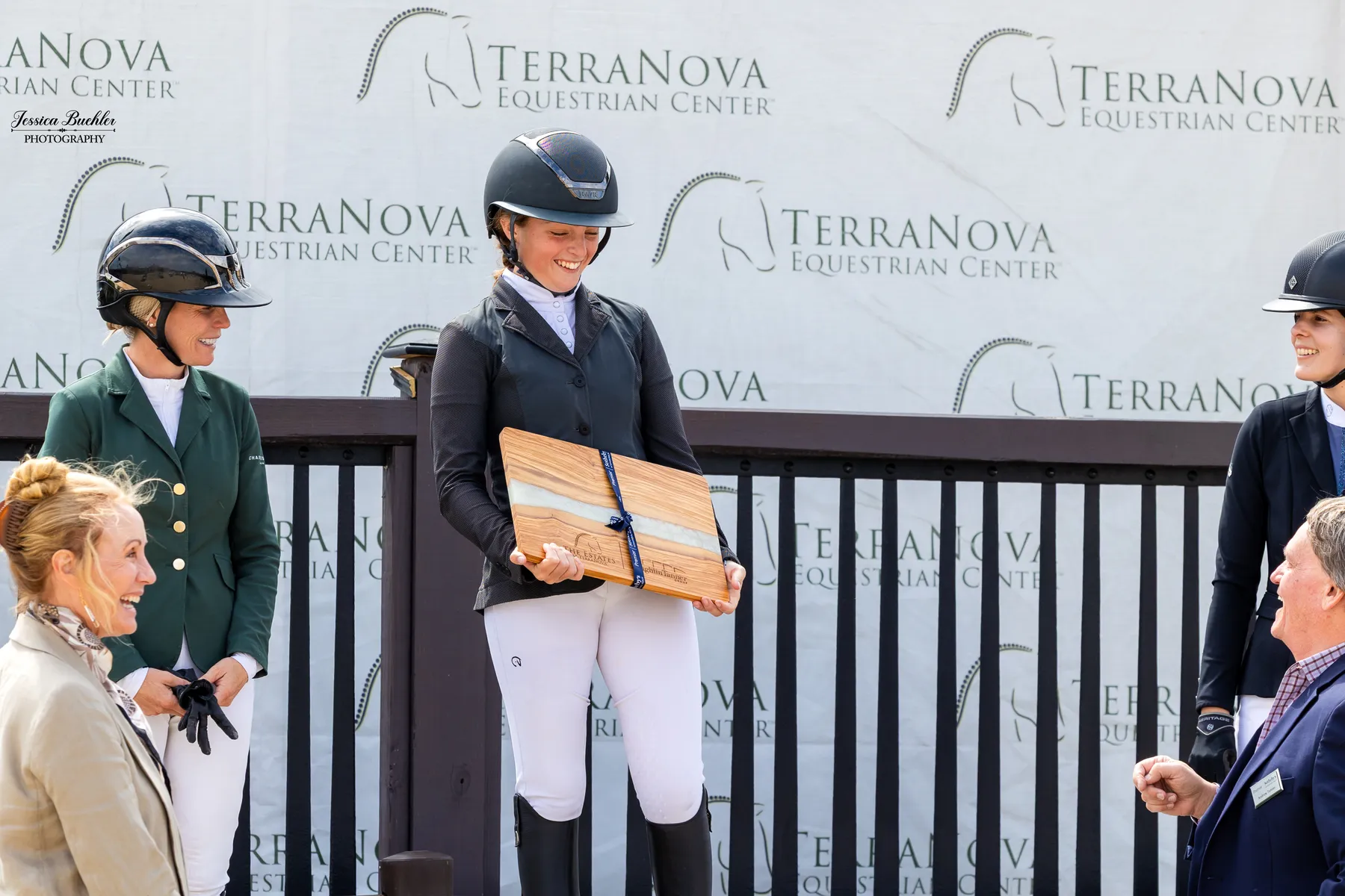 Mia Bagnato accepts the Owner's Award at the Everglades Equipment Group FEI Grand Prix
