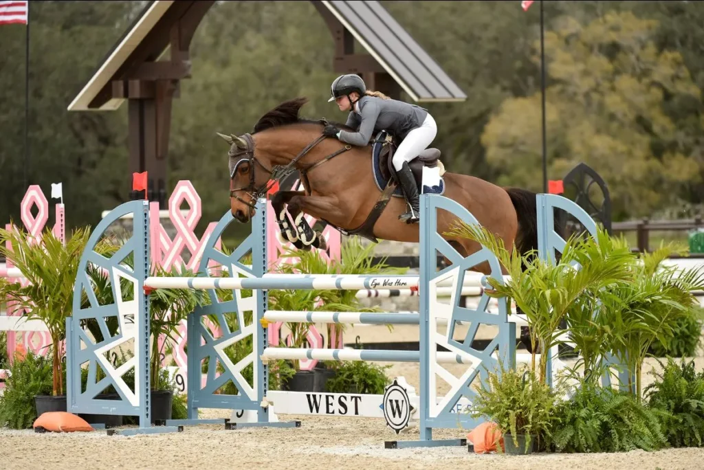 Morgan Ashby riding Bon Chatsworth Pierre to win the $15,000 1.30m Junior/Amateur Jumper Classic at TerraNova