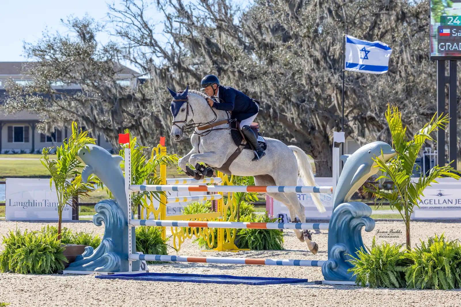 Samuel Parot riding over a jump in the $20,000 Blalock Walters 1.35m TerraNova Prix at the Lakeside Arena