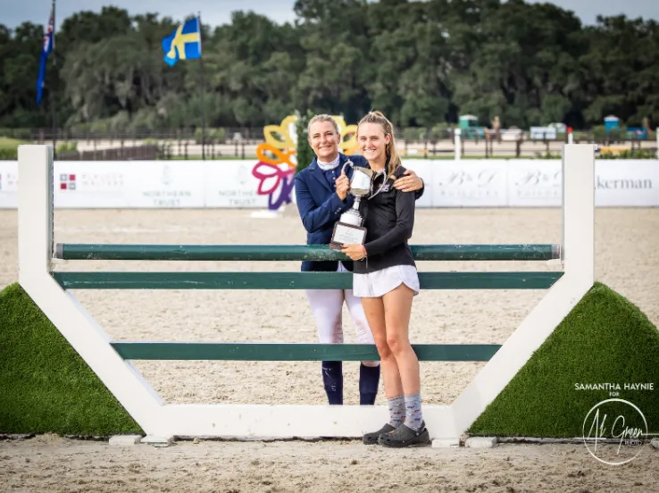 Sara Kozumplik-Murphy presents Sarah Bowman with the Sara Kozumplik-Murphy Young Rider Sportsmanship Award at The Event at TerraNova