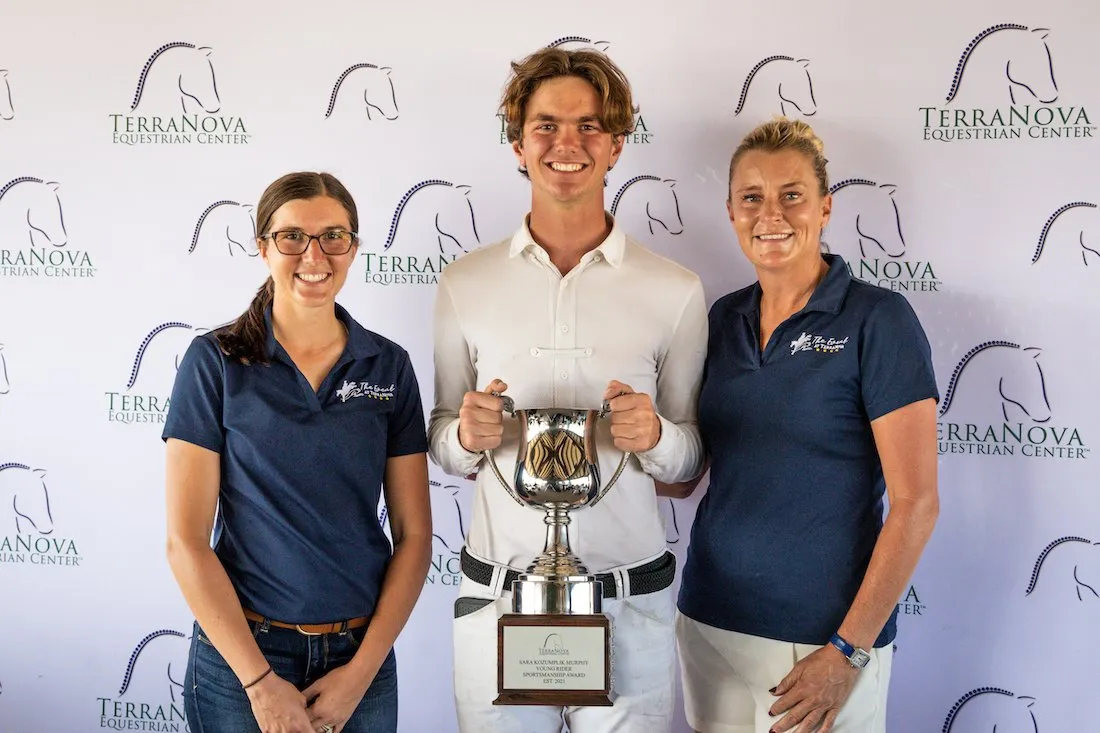 Hannah Herrig Ketelboeter and Sara Kozumplik present Benjamin Noonan with the Sara Kozumplik Young Rider Sportsmanship Award at The Event at TerraNova 2022