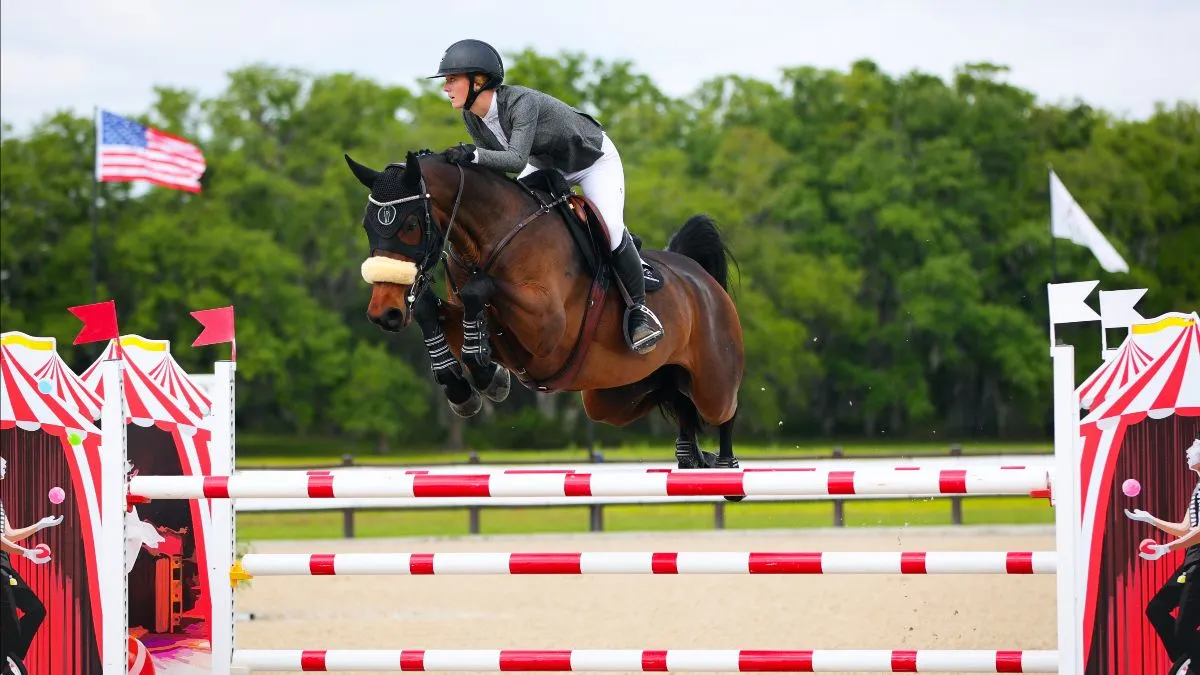 Stella Stinnett riding Storiall Blue to second place in The Estates at TerraNova FEI 1.45m Grand Prix