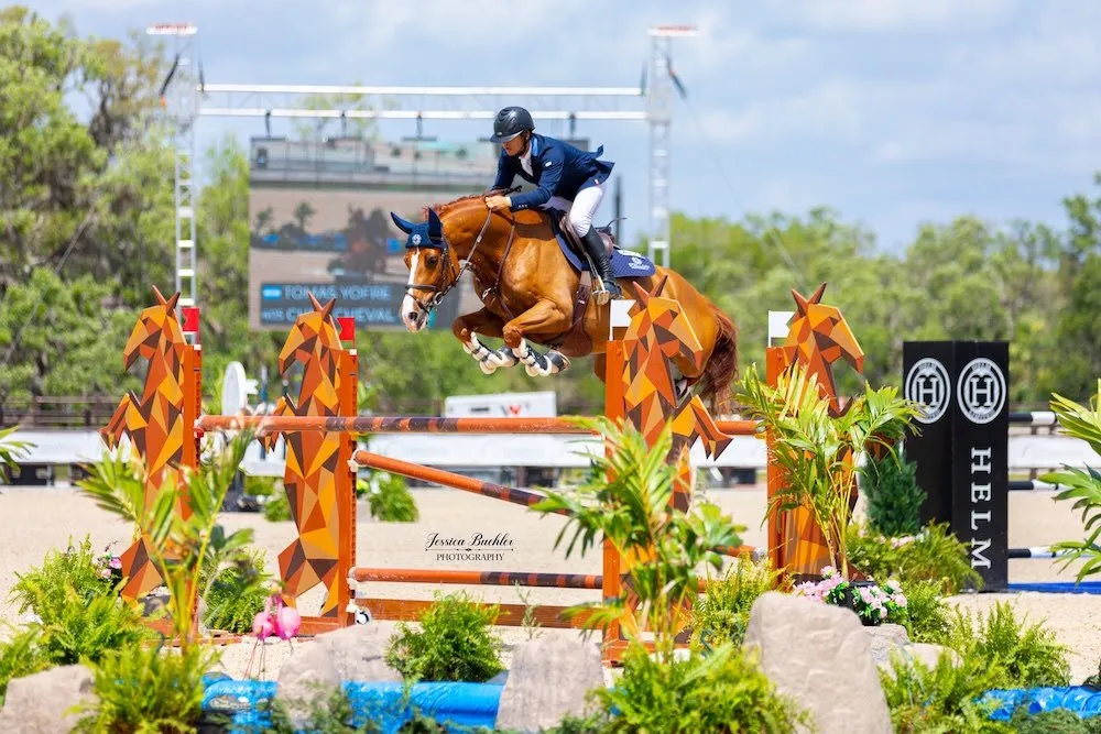 Tomas Yofre riding Cher Cheval over a jump in the $77,300 The Estates at TerraNova FEI 2* 1.45m Grand Prix