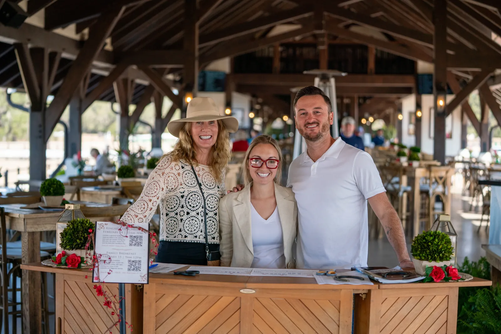 Guests at the pavilion welcome desk at TerraNova Equestrian Center